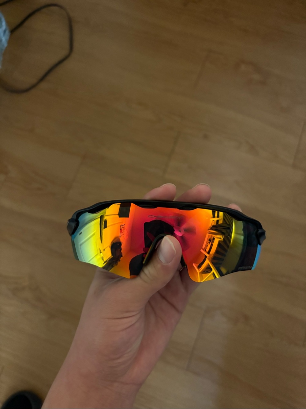 Oakley Black Frame VR/AR Glasses with Red-Orange Mirrored Lens